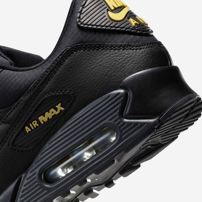 Кросівки Nike Air Max 90 IB7680-001 у чорно-жовтому кольорі з фірмовою амортизацією Air.