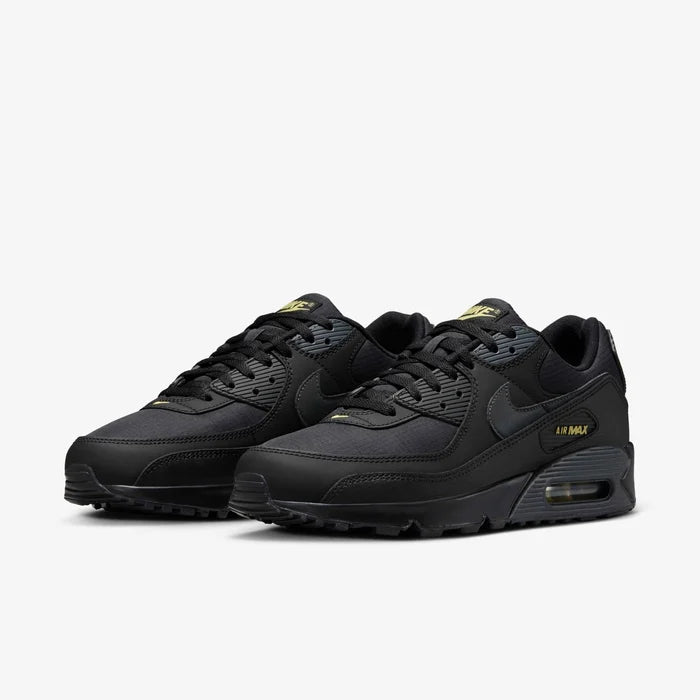 Кросівки Nike Air Max 90 IB7680-001 у чорно-жовтому кольорі з фірмовою амортизацією Air.